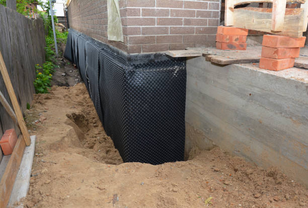 Happy homeowners after waterproofing job in Del Rio